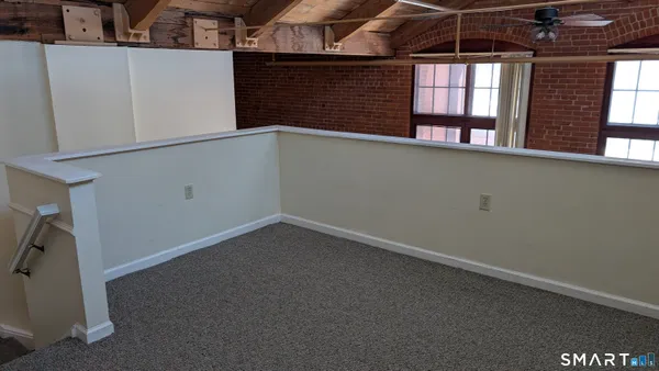 a view of a window in an empty room