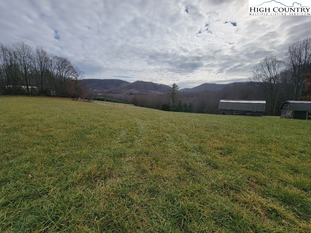 Golf Course Road, Unit 1A Sparta, NC 28675 - Photo 3 of 8 a view of an outdoor space and mountain