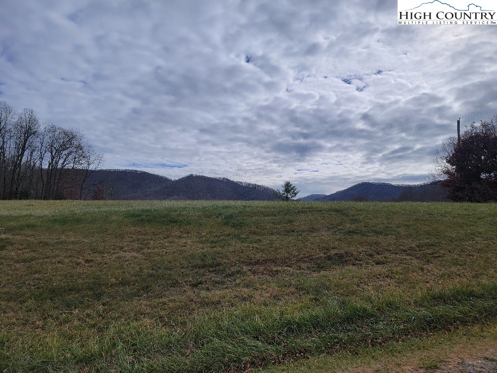 Golf Course Road, Unit 1A Sparta, NC 28675 - Photo 8 of 8 a view of an outdoor space and mountain view