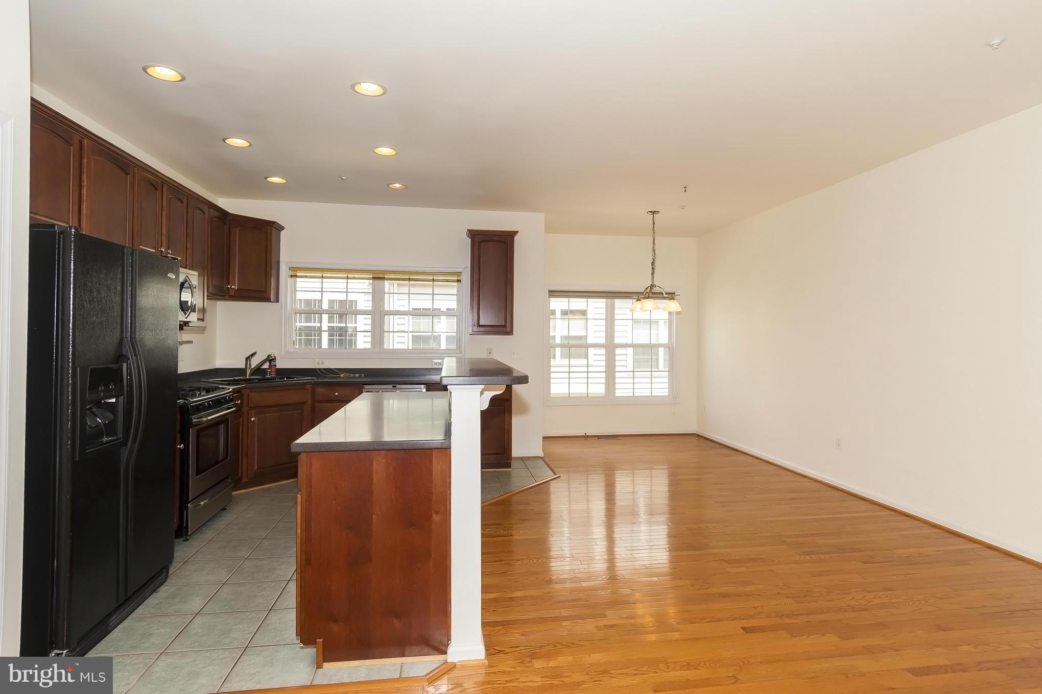10256 Rutland Round Road, Unit 14 Columbia, MD 21044 - Photo 8 of 27 KITCHEN TO FAMILY ROOM