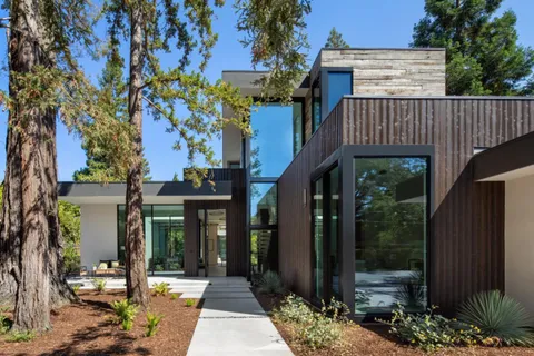 a view of a house with a garden