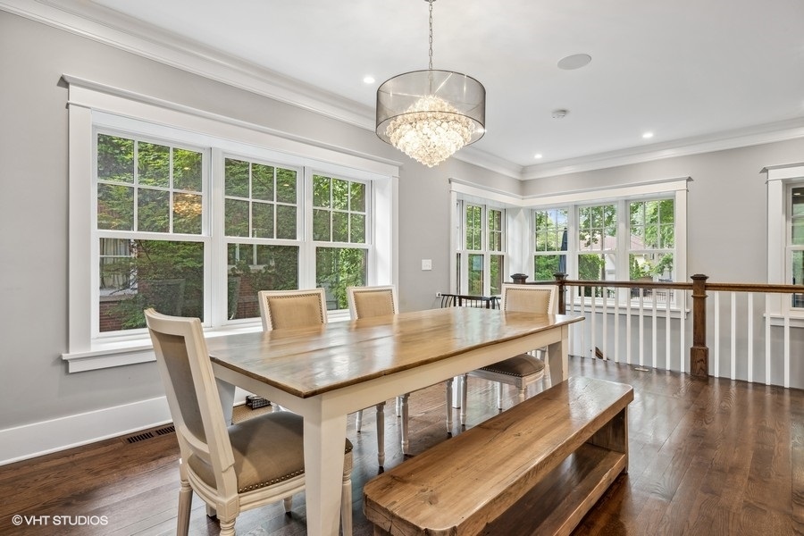 2236 Wesley Avenue Evanston, IL 60201 - Photo 12 of 25 a view of a dining room with furniture window and wooden floor