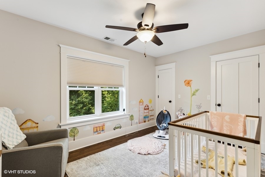 2236 Wesley Avenue Evanston, IL 60201 - Photo 21 of 25 a bedroom with furniture and window