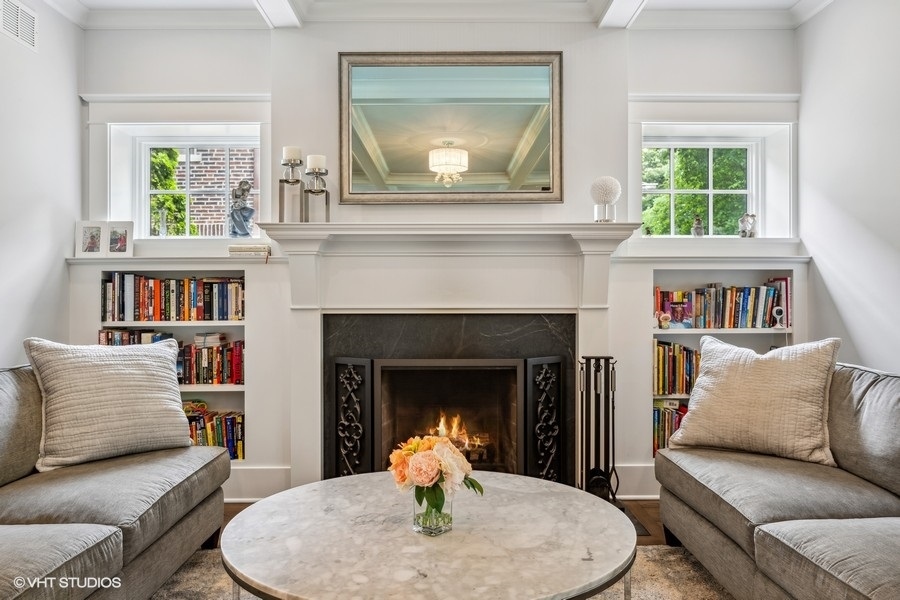 2236 Wesley Avenue Evanston, IL 60201 - Photo 4 of 25 a living room with furniture and a fireplace
