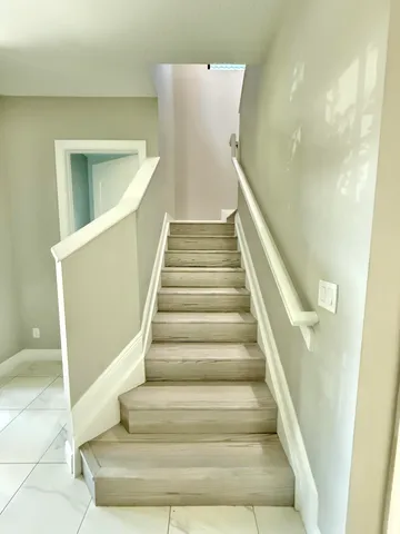 a room with furniture and a wooden floor