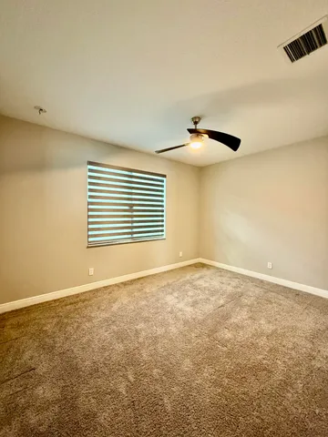 a view of a field with an ocean