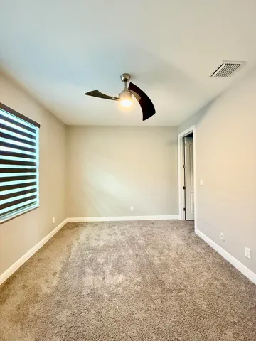 a view of a lake with a big yard