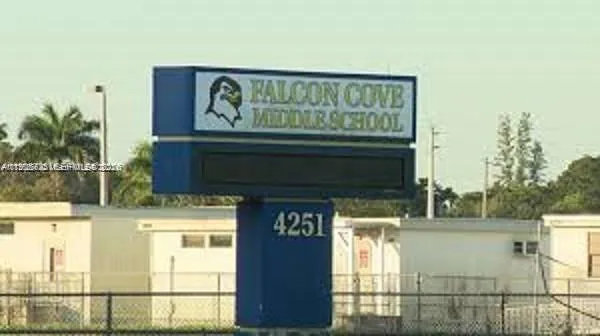 a view of a garden with a lake view