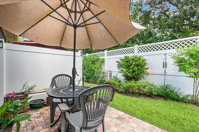 a view of living room filled with furniture and a rug