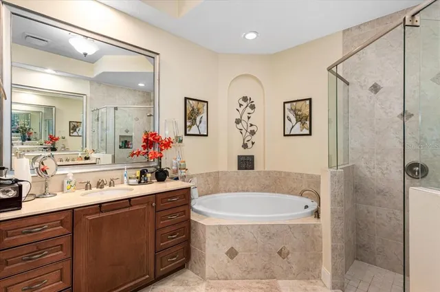 a view of swimming pool with table and chairs