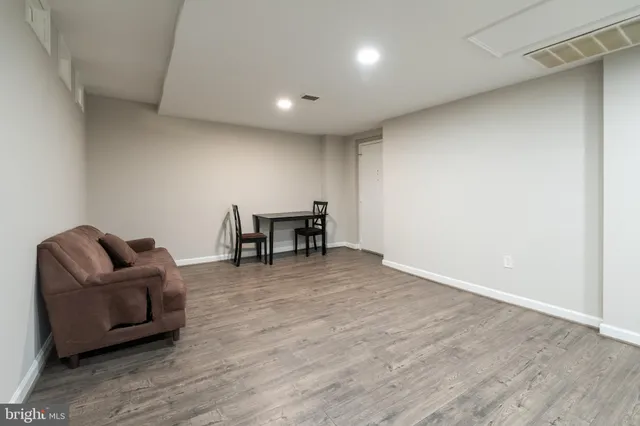 a view of livingroom with furniture and wooden floor