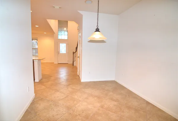 a kitchen with stainless steel appliances granite countertop a sink counter space cabinets and a stove