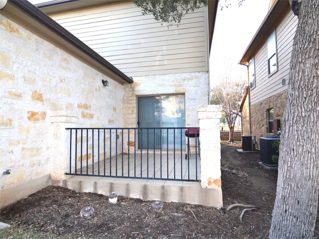 a view of a porch with furniture