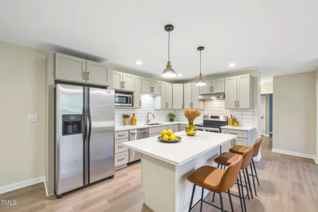 $320,000 | 124 Twin Oaks Place, Cary, NC 27511