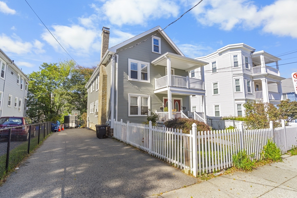 36 Turner Street, Unit 2 Boston, MA 02135 - Photo 1 of 31 a view of a white house with iron fence