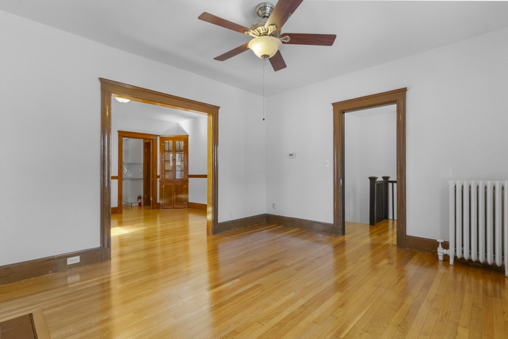 36 Turner Street, Unit 2 Boston, MA 02135 - Photo 21 of 31 a view of an empty room with wooden floor
