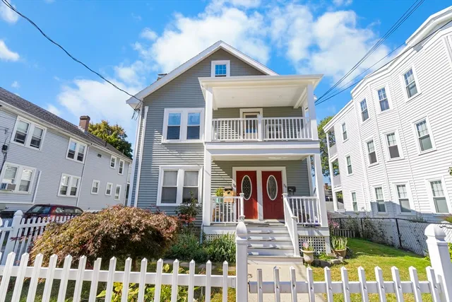 a front view of a house with balcony