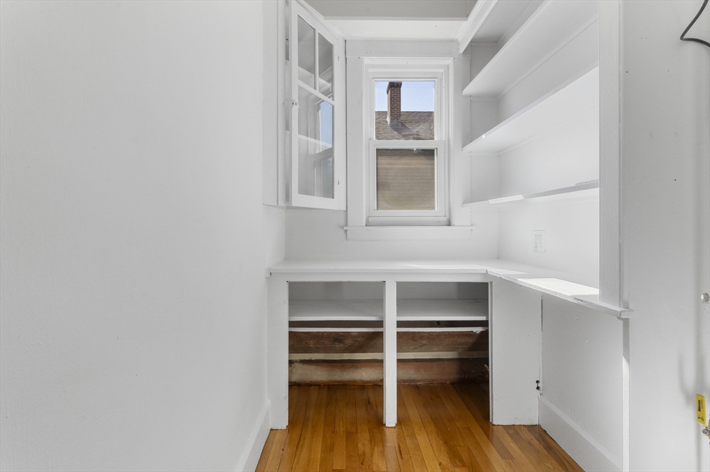 36 Turner Street, Unit 2 Boston, MA 02135 - Photo 6 of 31 a view of walk in closet with empty racks