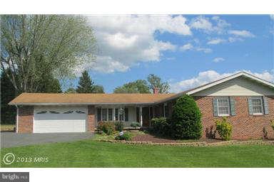 1006 Sturbridge Road, Unit 1006 Fallston, MD 21047 - Photo 1 of 11 a front view of a house with a yard and trees