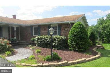 1006 Sturbridge Road, Unit 1006 Fallston, MD 21047 - Photo 2 of 11 front view of house with a yard