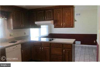 1006 Sturbridge Road, Unit 1006 Fallston, MD 21047 - Photo 11 of 11 a kitchen with a sink cabinets and a window