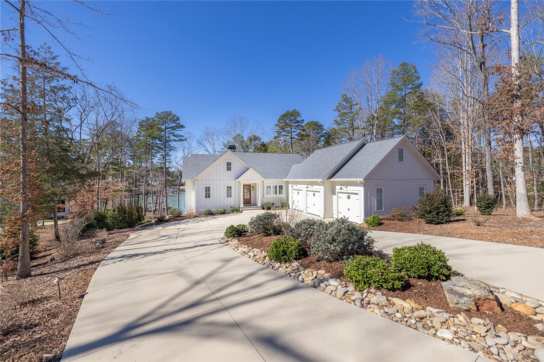 516 Pointe W Drive Seneca, SC 29672 - Photo 2 of 47 As you approach the home, you’re greeted by a conc