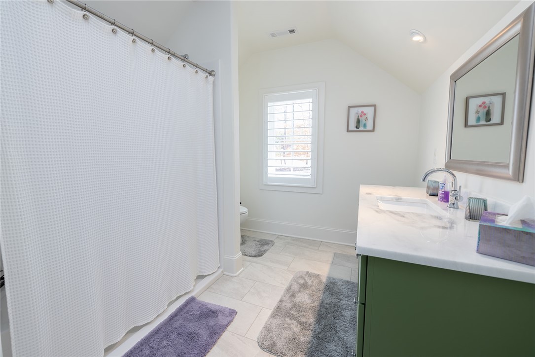 516 Pointe W Drive Seneca, SC 29672 - Photo 27 of 47 The suite includes a bedroom with a walk-in closet