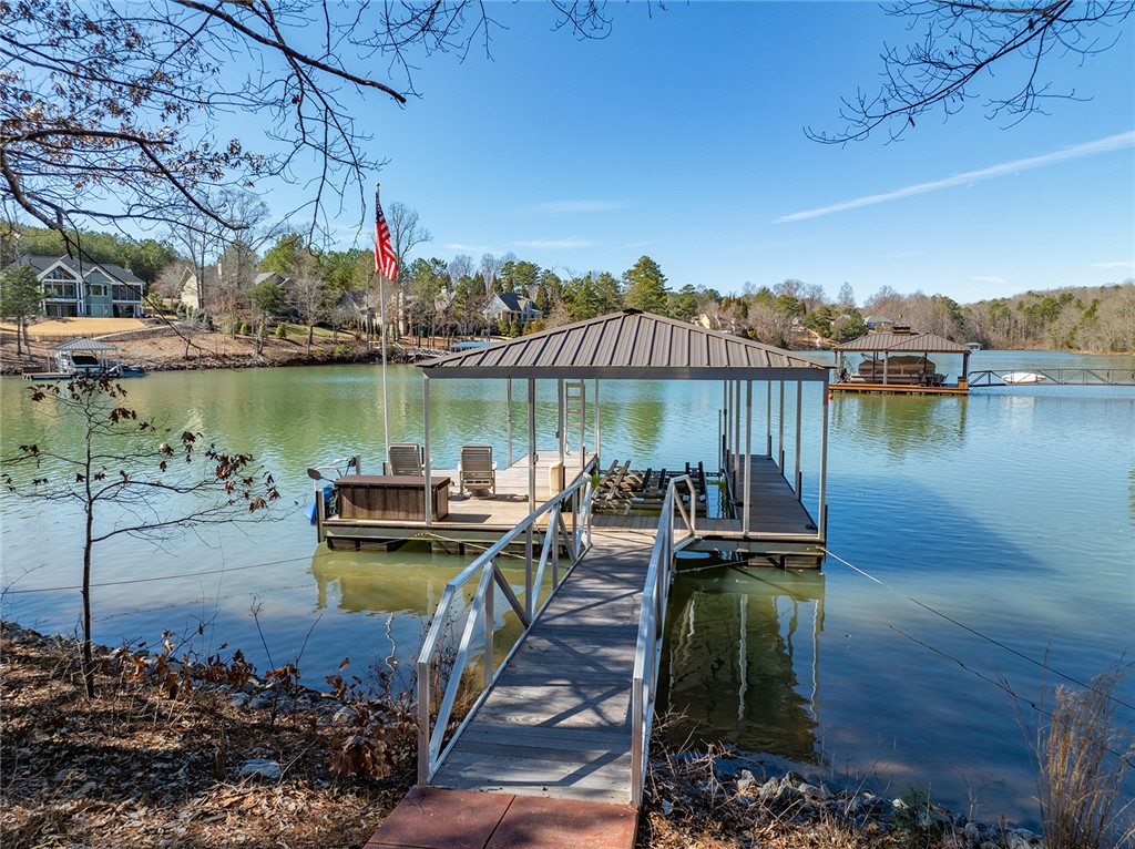 516 Pointe W Drive Seneca, SC 29672 - Photo 42 of 47 A gently sloping cart path leads to a covered sing
