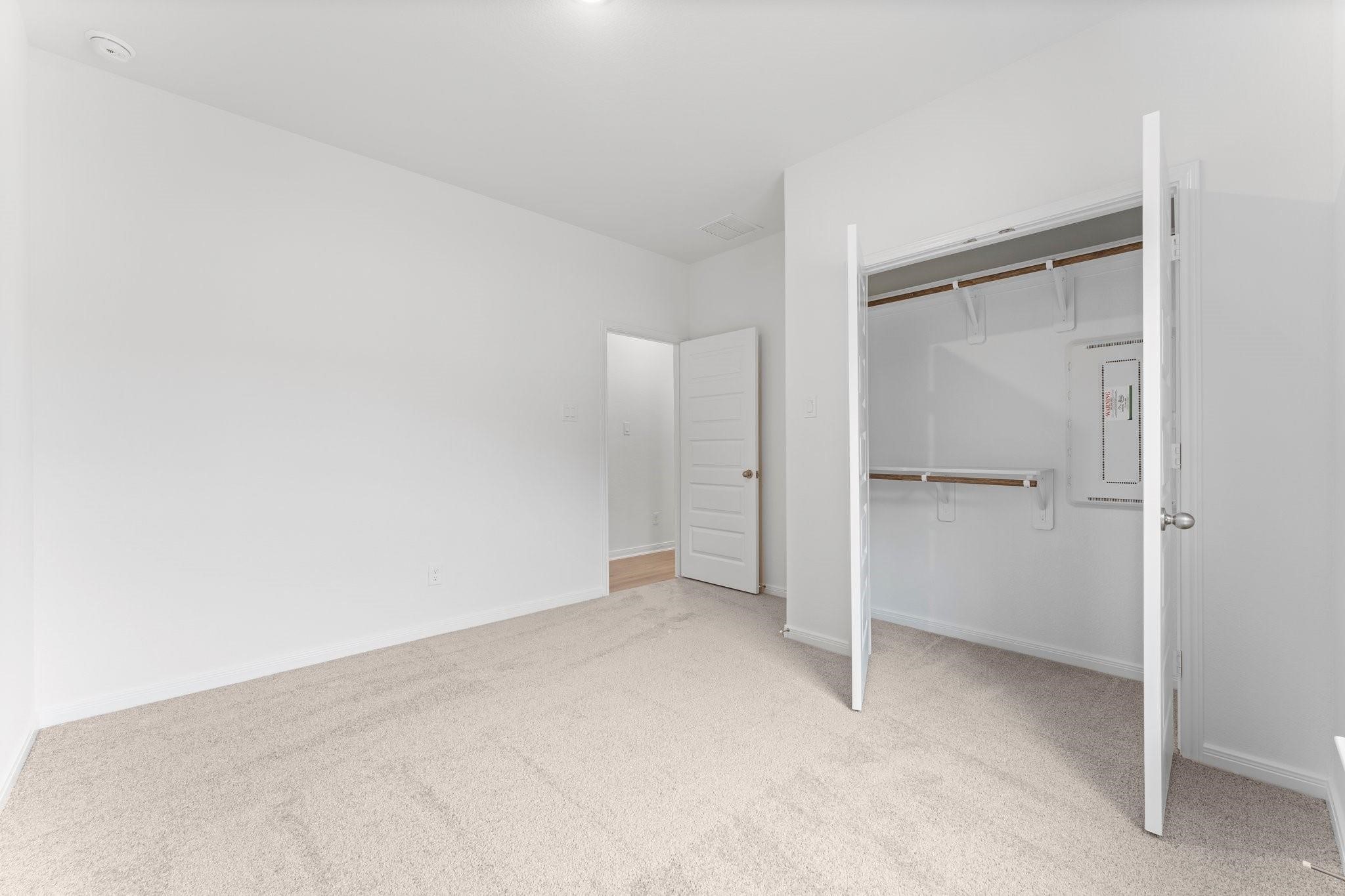 12011 Noble Heart Drive Willis, TX 77318 - Photo 12 of 35 a view of an empty room