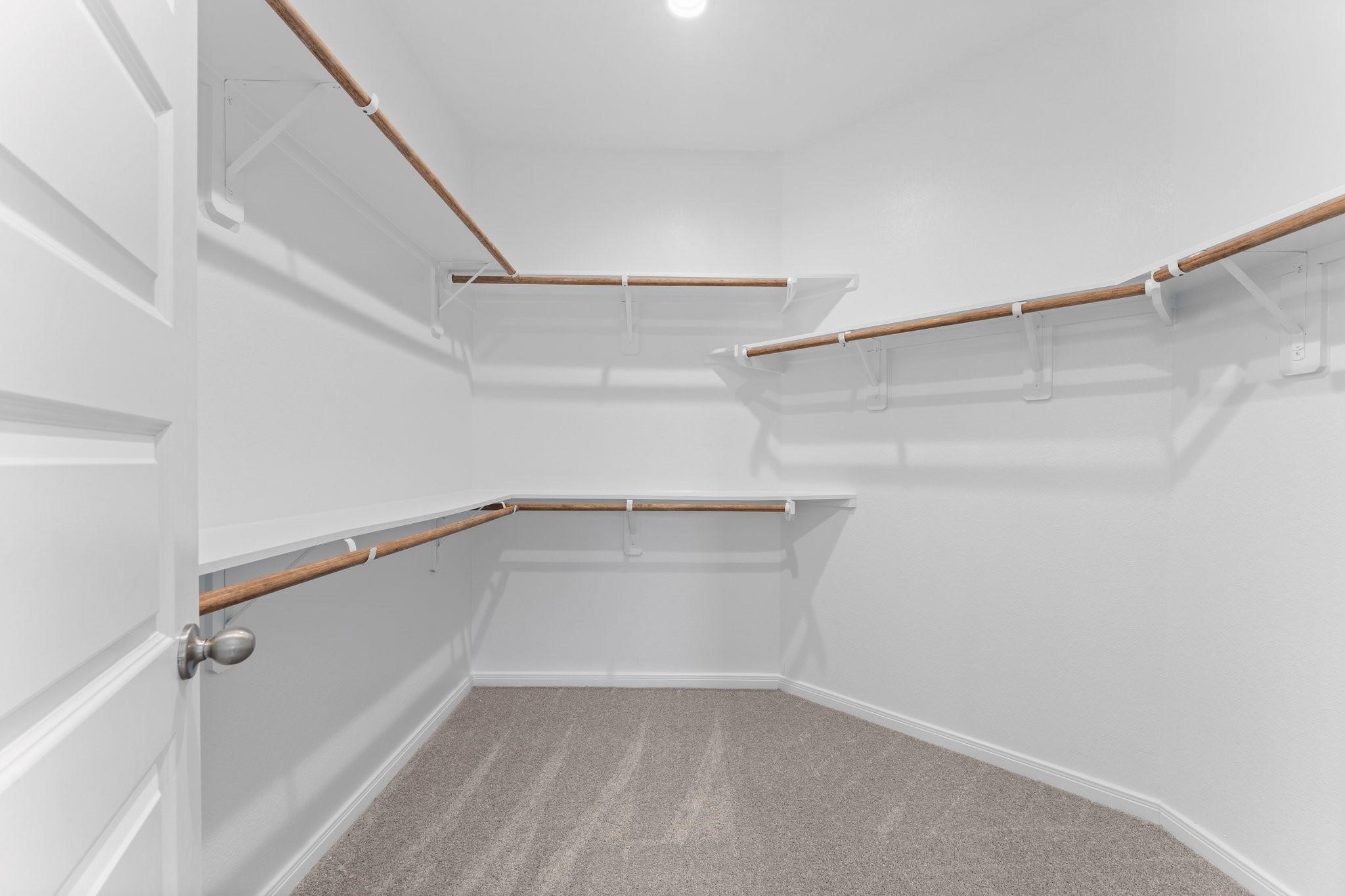 12011 Noble Heart Drive Willis, TX 77318 - Photo 31 of 35 a view of an empty walk in closet