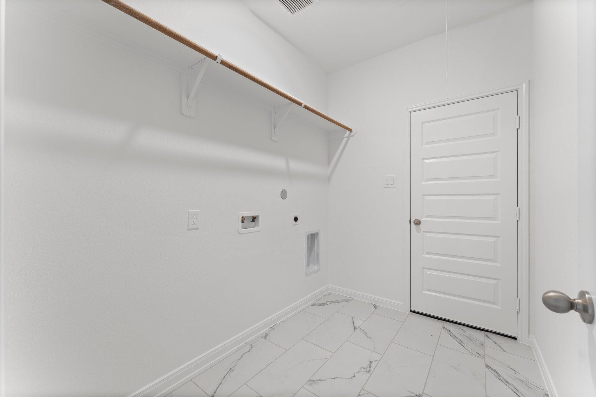 12011 Noble Heart Drive Willis, TX 77318 - Photo 32 of 35 a view of an empty walk in closet