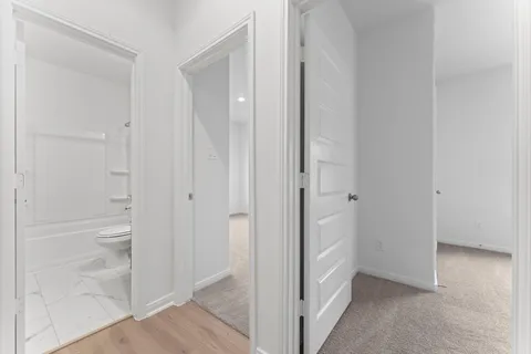 a bathroom with white walls