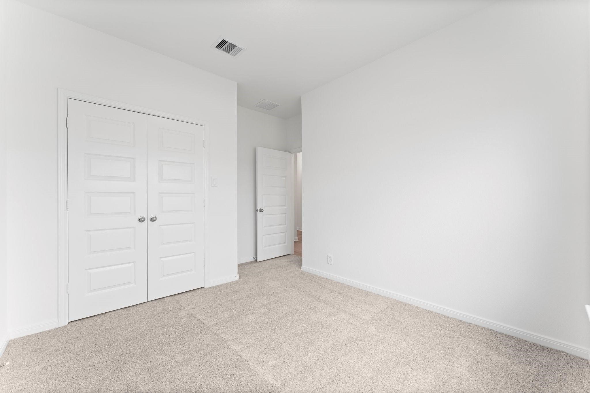 12011 Noble Heart Drive Willis, TX 77318 - Photo 10 of 35 a view of an empty room