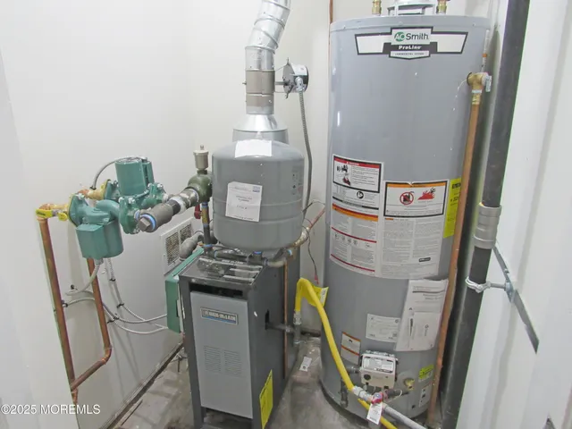 a utility room with dryer washer and dryer