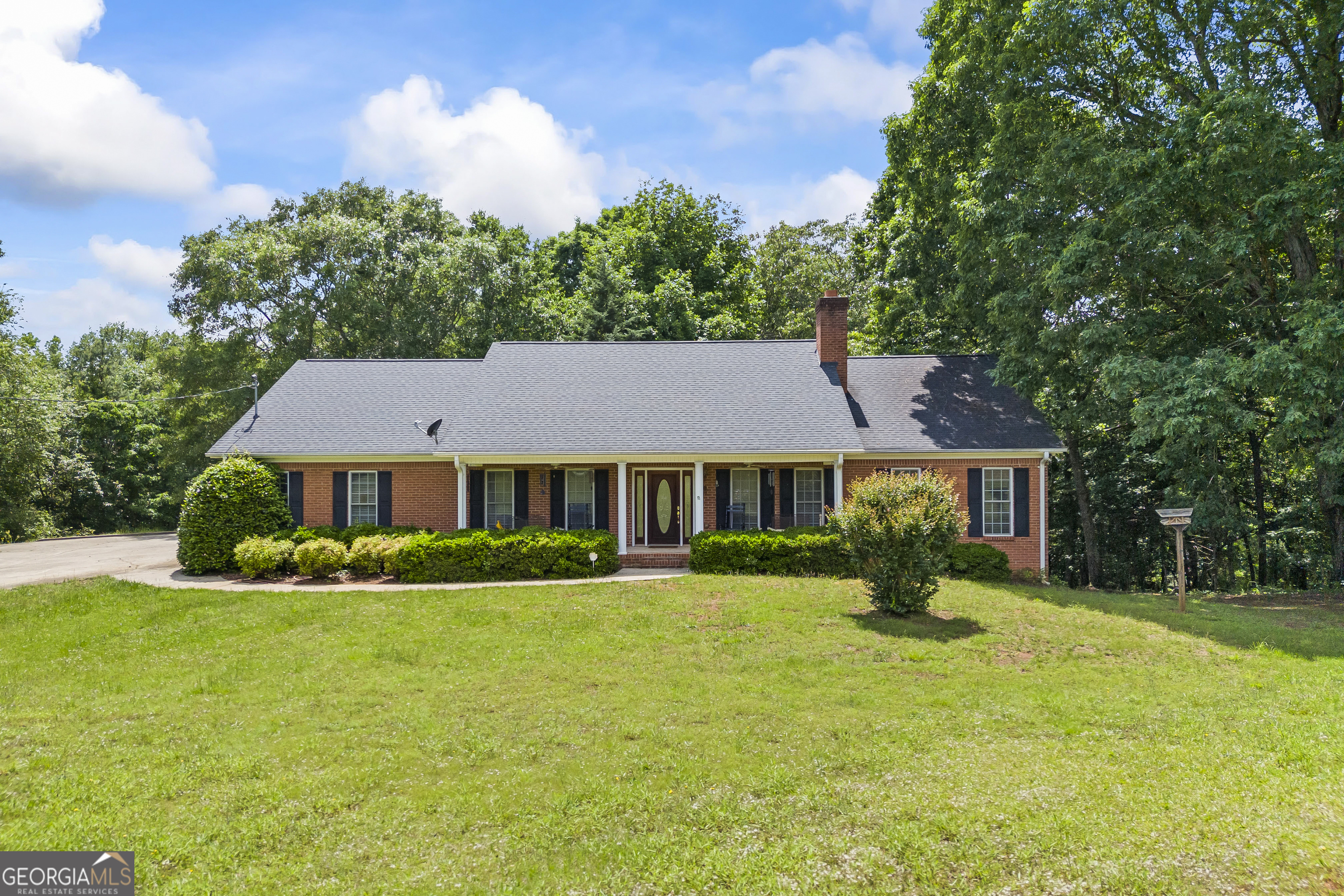 1112 Reno Road Royston, GA 30662 - Photo 12 of 74 a front view of a house with garden