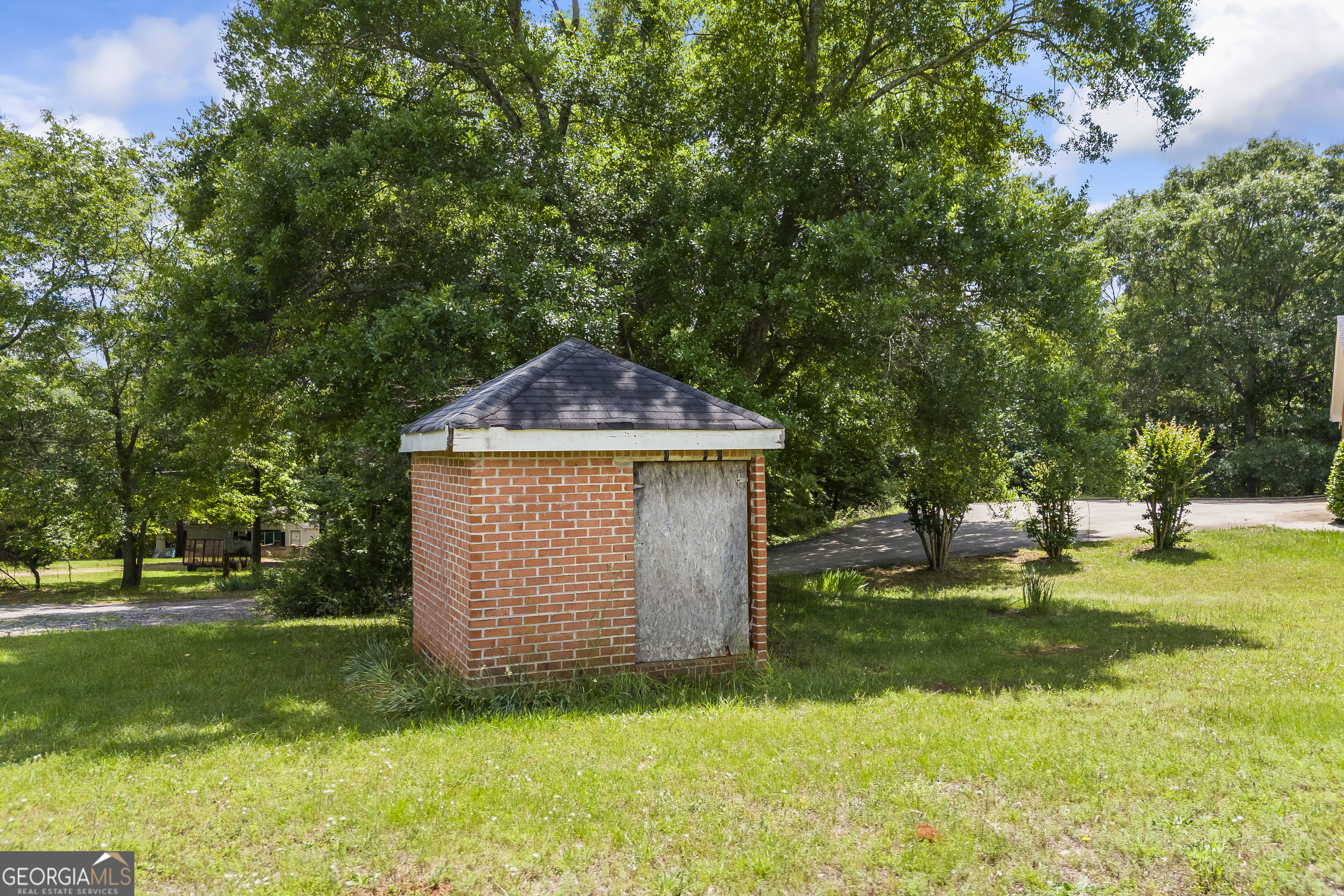 1112 Reno Road Royston, GA 30662 - Photo 16 of 74 a front view of a house with a yard