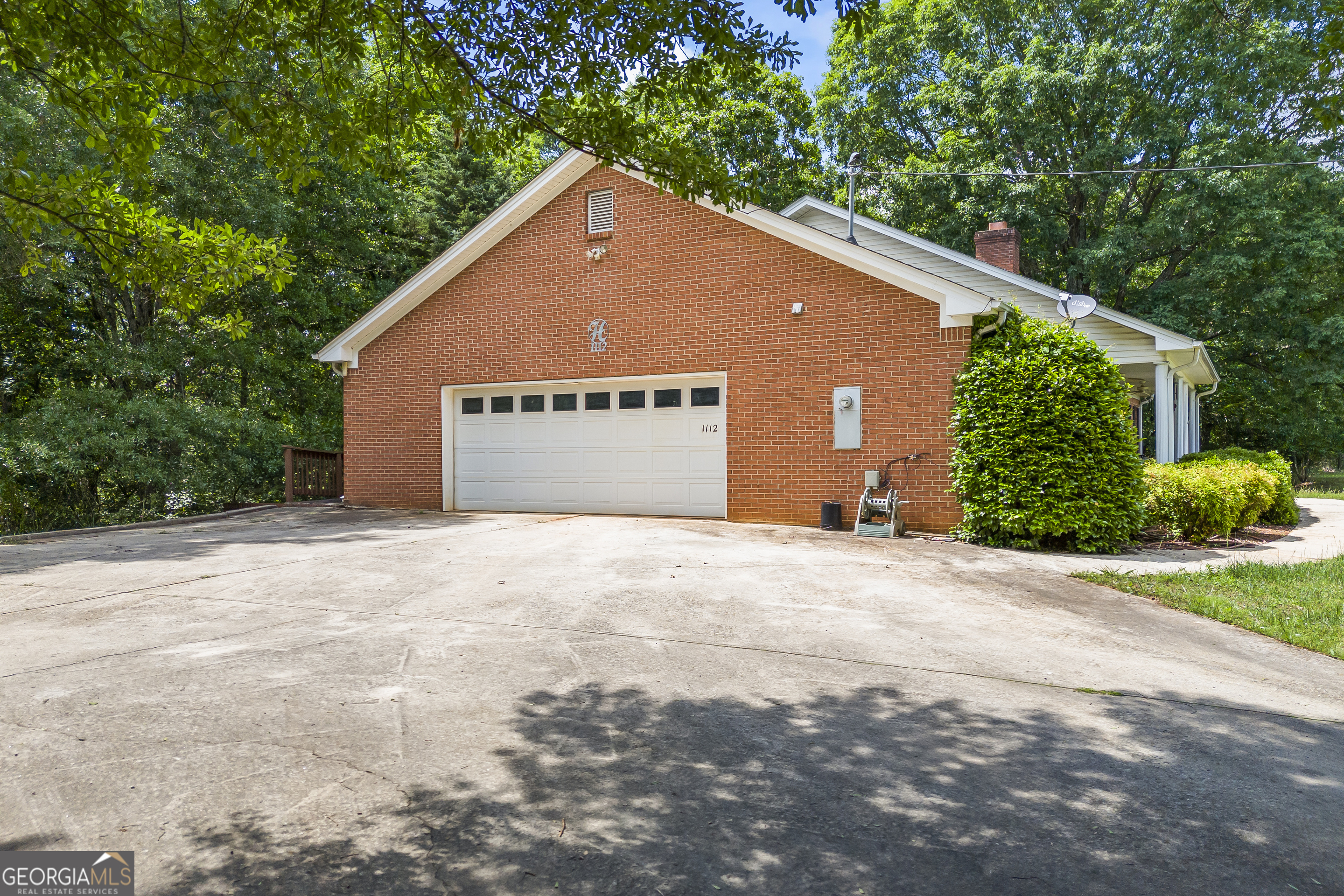 1112 Reno Road Royston, GA 30662 - Photo 19 of 74 a view of a house with a yard