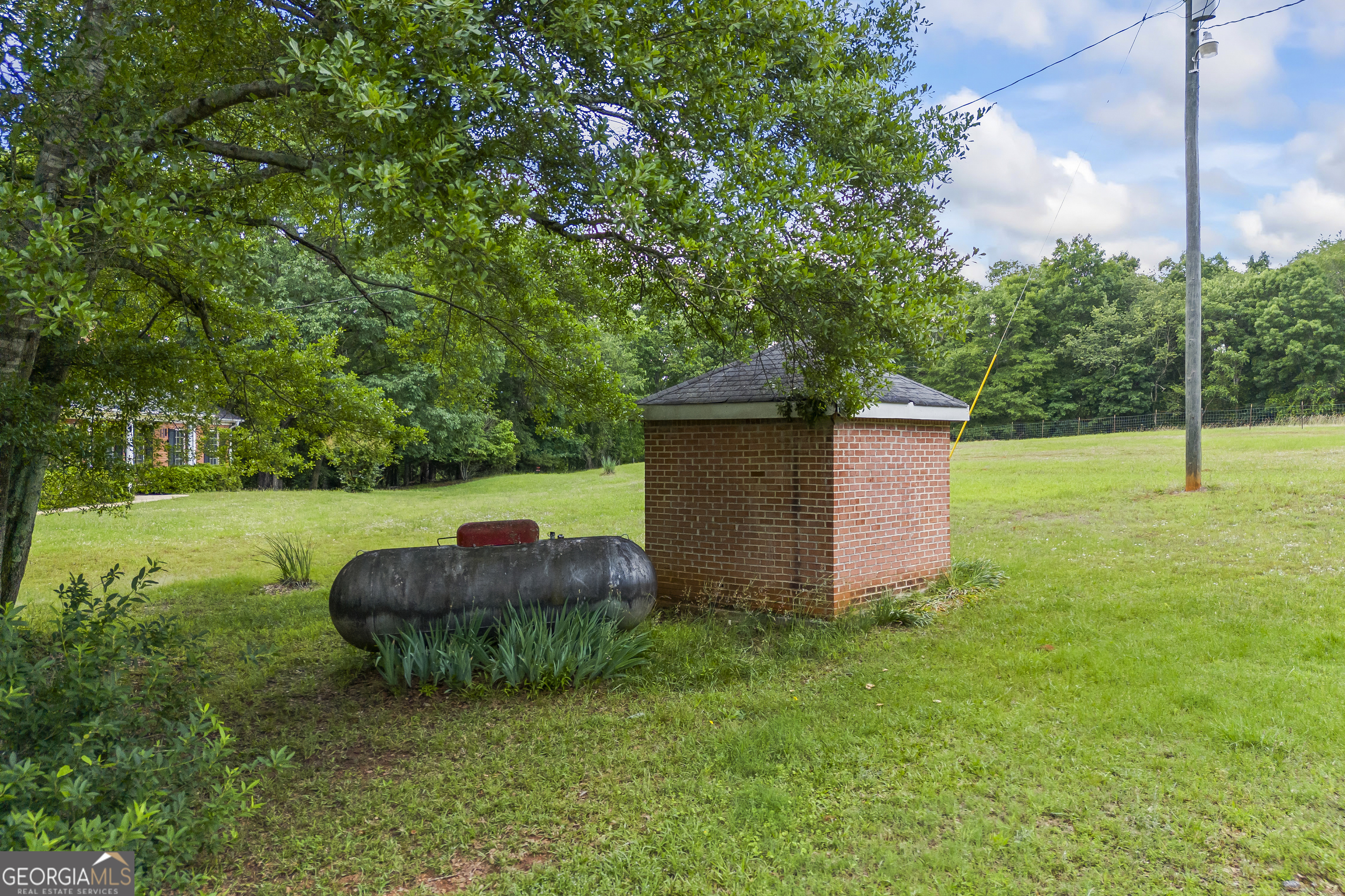 1112 Reno Road Royston, GA 30662 - Photo 26 of 74 a view of a garden with a slide