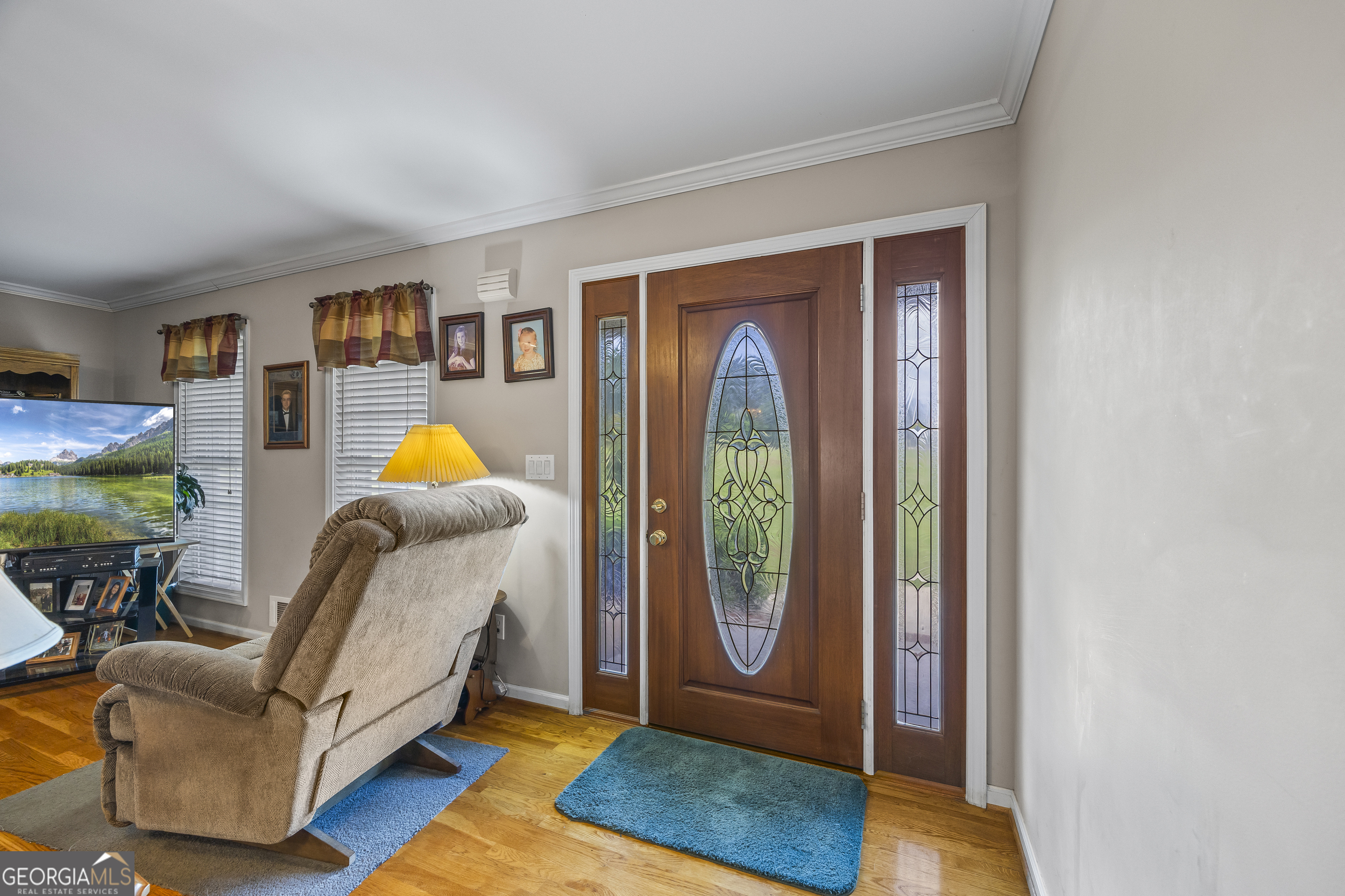 1112 Reno Road Royston, GA 30662 - Photo 29 of 74 a living room with furniture and a window