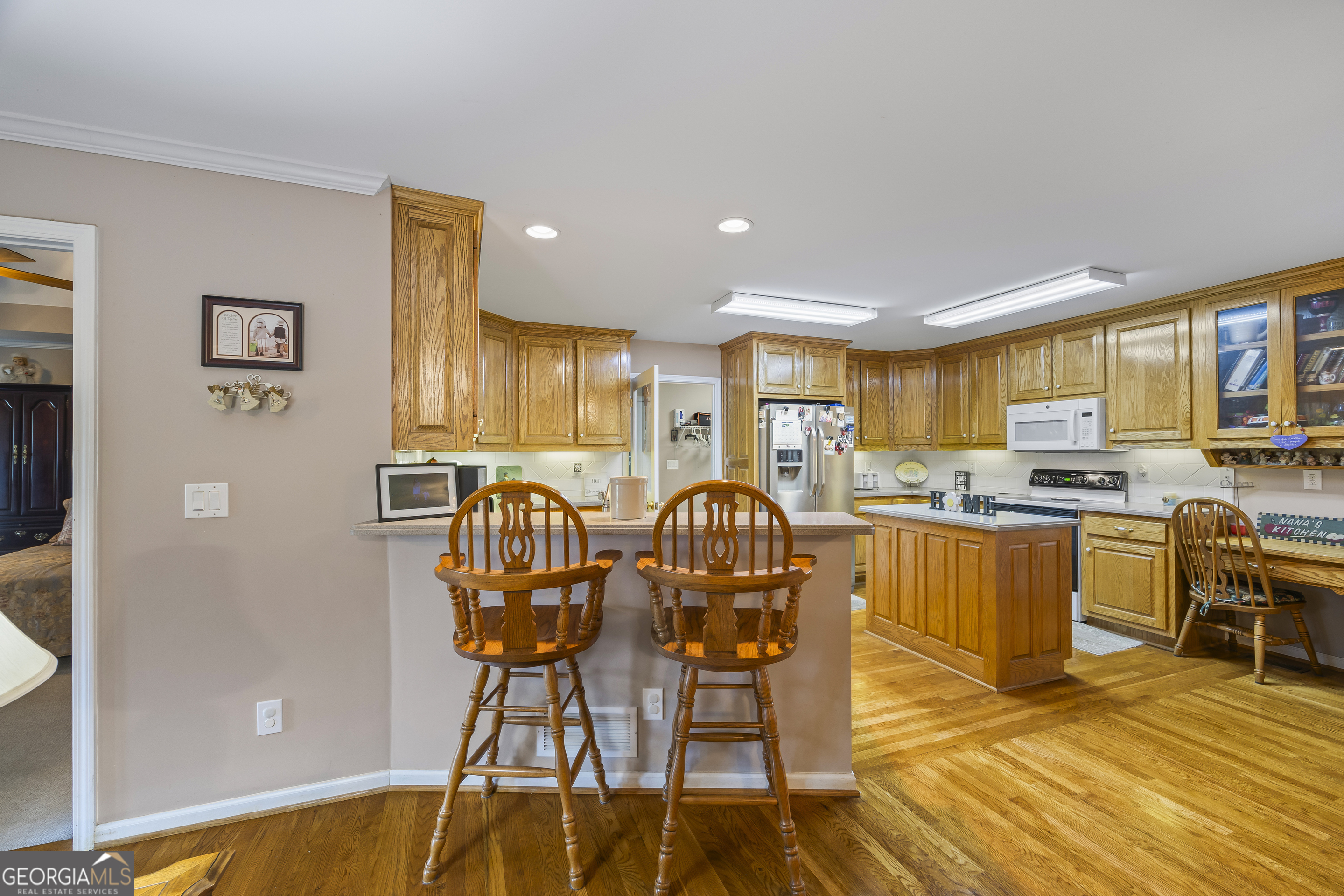 1112 Reno Road Royston, GA 30662 - Photo 38 of 74 a view of a dining room with furniture kitchen and wooden floor