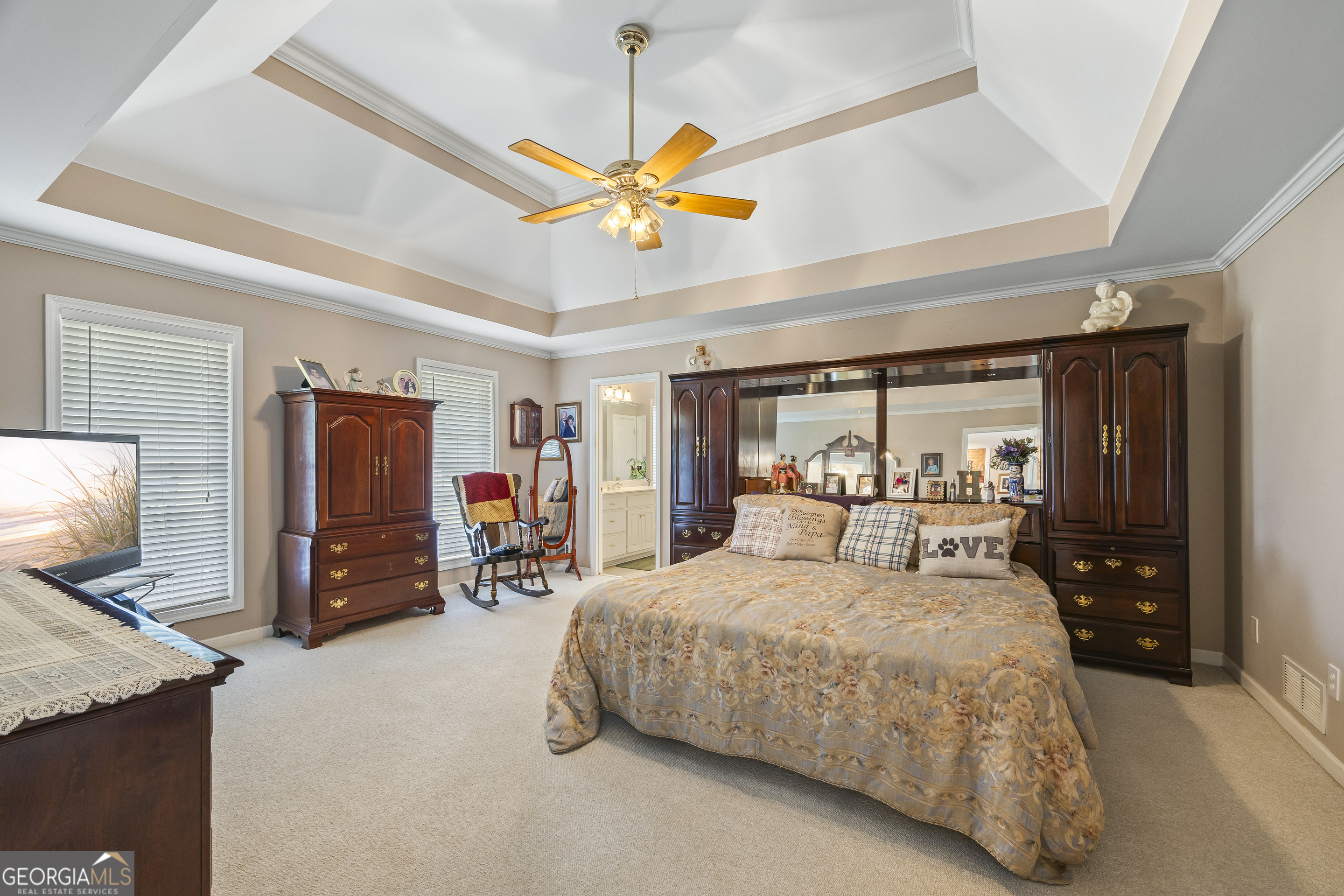 1112 Reno Road Royston, GA 30662 - Photo 56 of 74 a bedroom with a bed and a flat screen tv