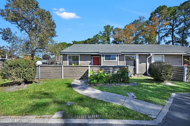 front view of a house and a yard