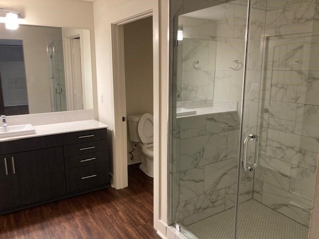 806 Sampson Street, Unit 209 Houston, TX 77003 - Photo 6 of 15 a bathroom with a sink a mirror and shower