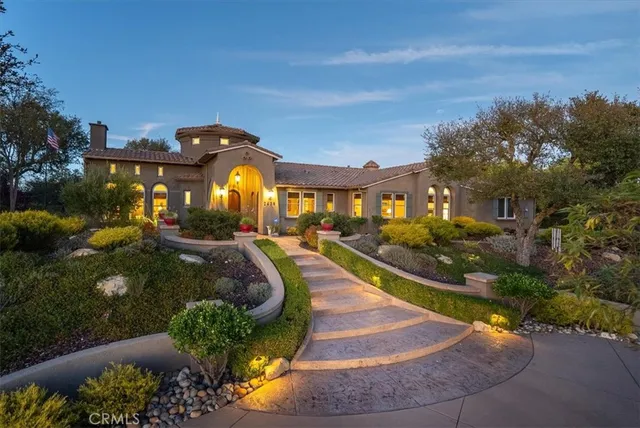 an aerial view of a house with a garden