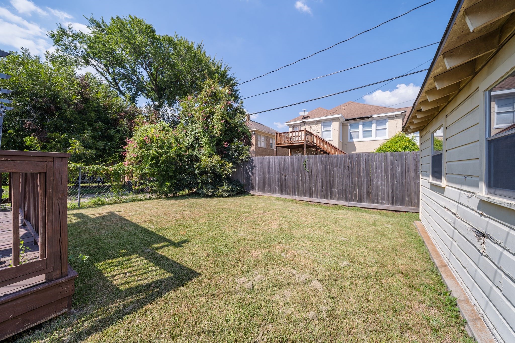 2505 Eagle Street Houston, TX 77004 - Photo 11 of 13 a view of a backyard with tub and wooden fence