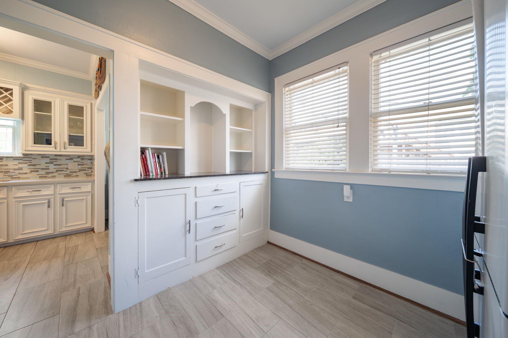 2505 Eagle Street Houston, TX 77004 - Photo 7 of 13 a room with a window and wooden floor