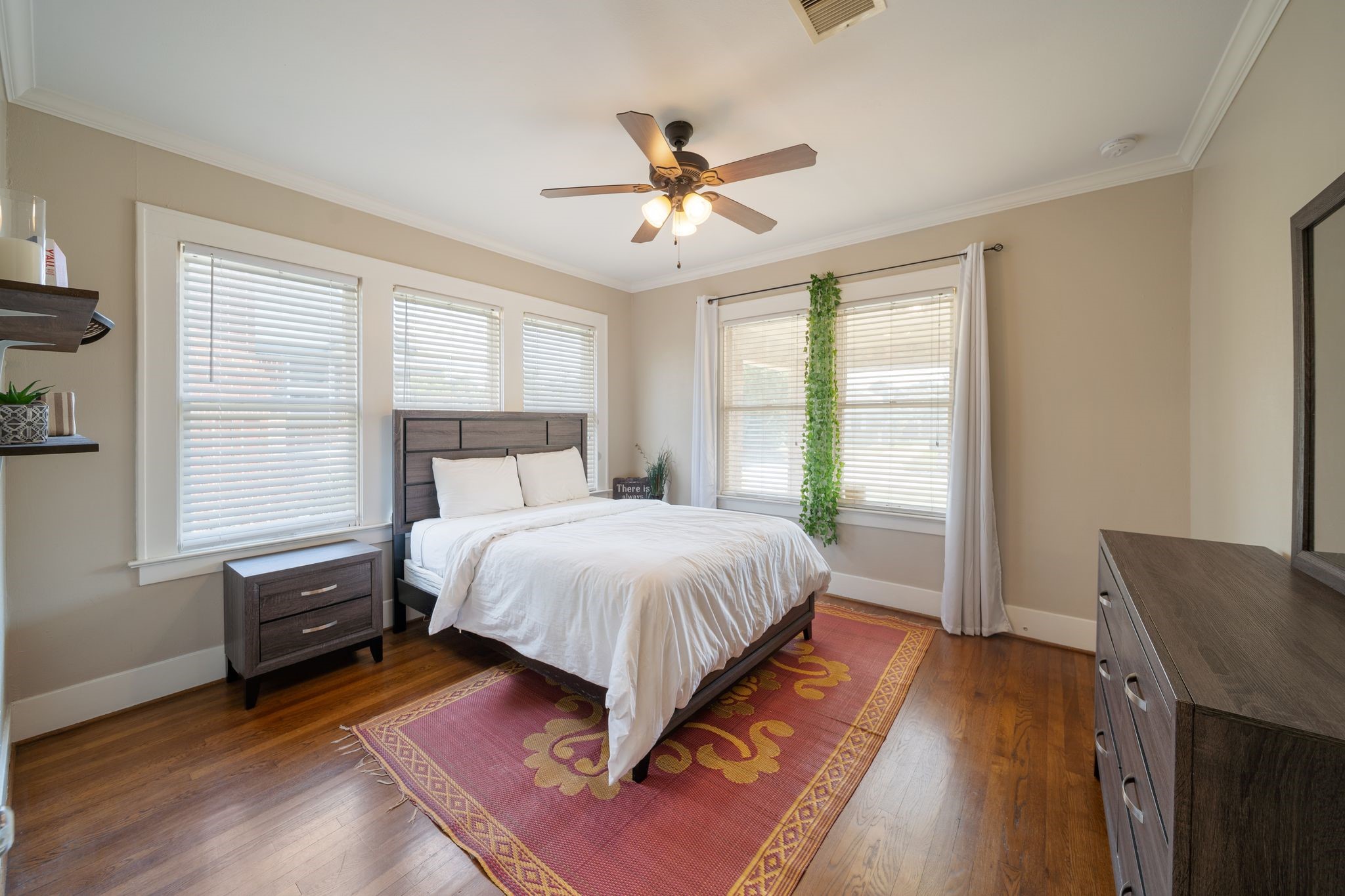 2505 Eagle Street Houston, TX 77004 - Photo 10 of 13 a spacious bedroom with a bed and window