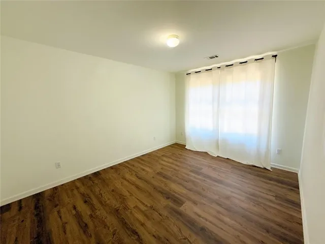 a bathroom with a double vanity sink mirror double and toilet