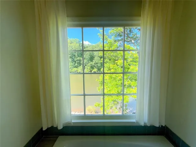 a view of a lake from a balcony