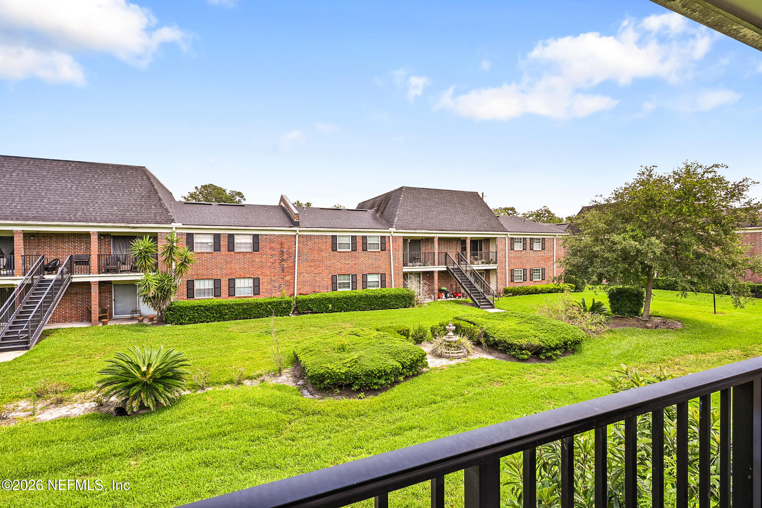 4915 Baymeadows Road, Unit 6G Jacksonville, FL 32217 - Photo 31 of 44 a view of a house with garden
